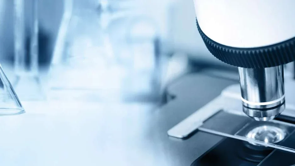 Close up of powerful microscope looking at slide sample 