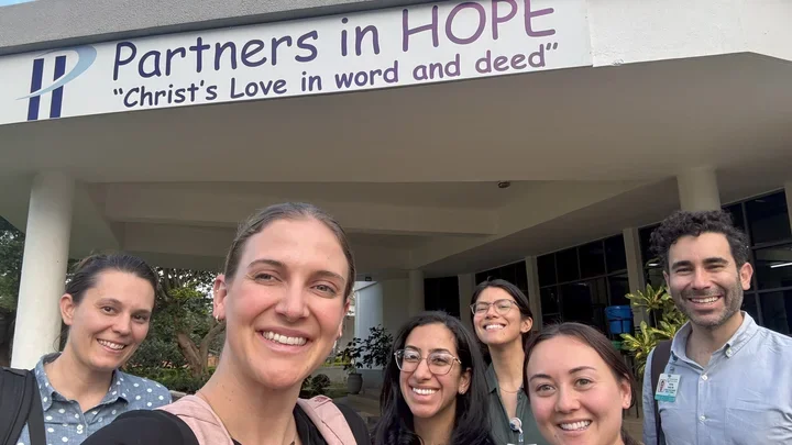 Team in front malawi clinic