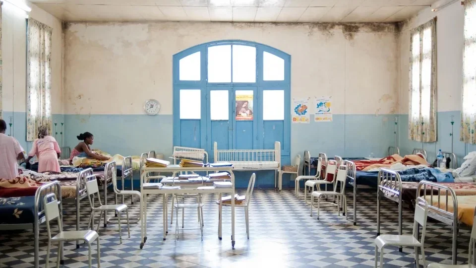 patients in bed at clinic in mozambique