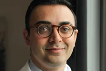Dr Abraar Karan
