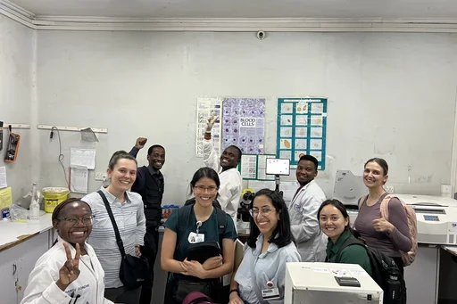  Ucla team in the lab looking at malaria slides