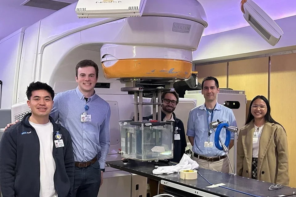 Julia Posadas, medical physicist from the University of the Philippines-Philippine General Hospital, joins medical physicists from the UCLA Department of Radiation Oncology (Dr. Jonathan Pham, Dr. John Charters, Dr. Mike Lauria, and Dr. Steve Tenn) to learn radiation machine calibration and quality assurance testing.