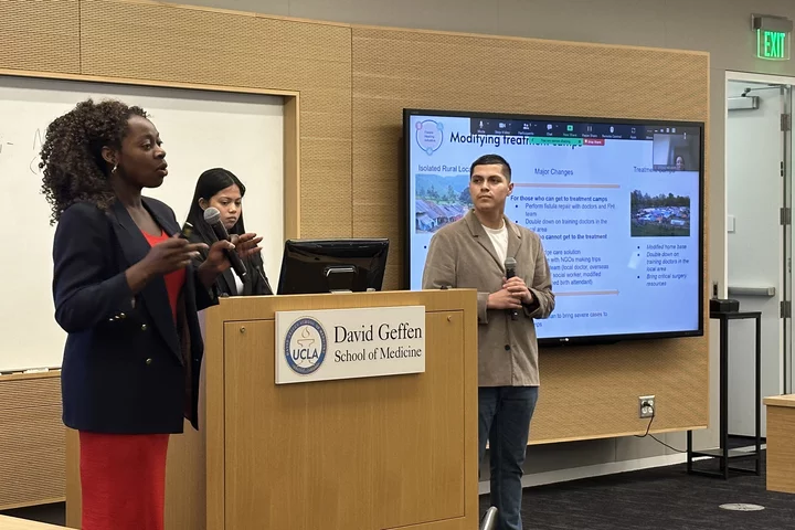 students presenting at case competition